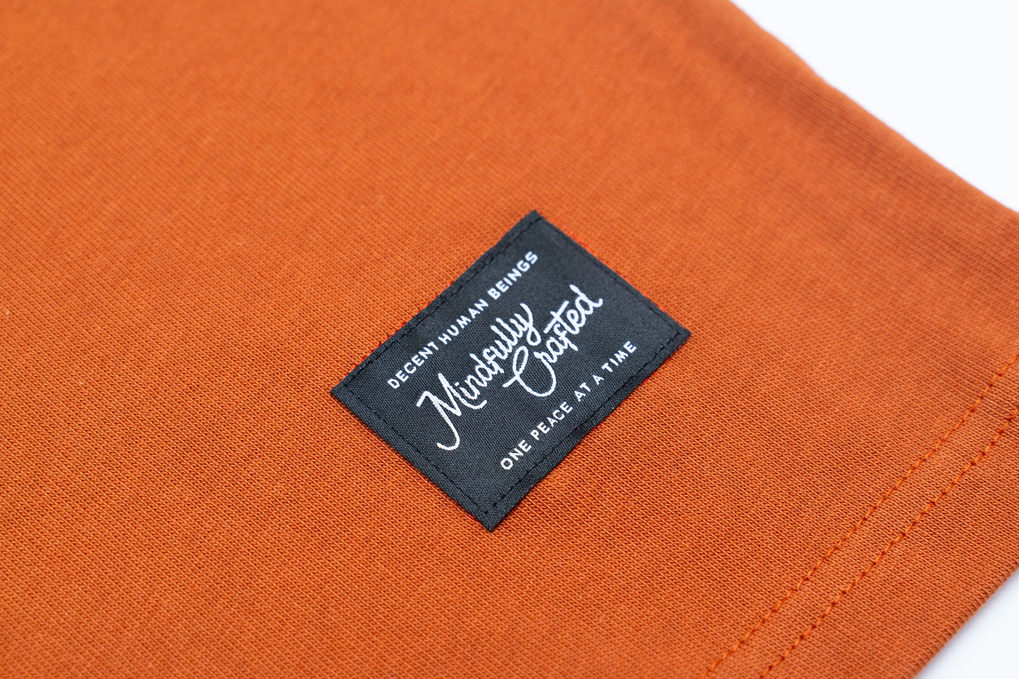 CIRCLE LOGO T-SHIRT - BURNT ORANGE